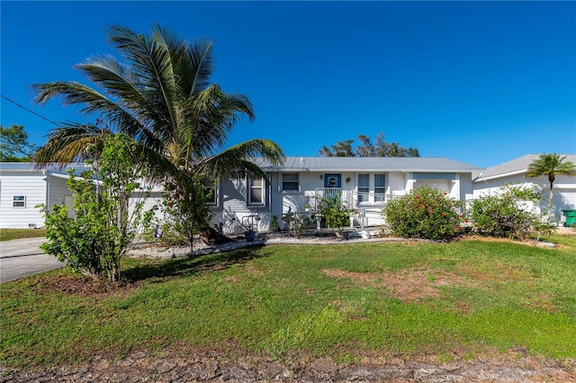 view of front of home with a front lawn