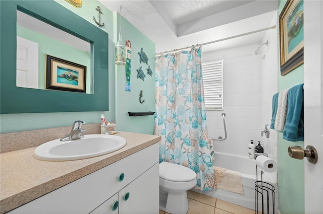 full bathroom featuring a textured ceiling, shower / bath combo, toilet, tile patterned floors, and vanity