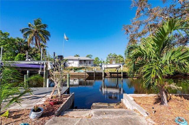 view of dock with a water view