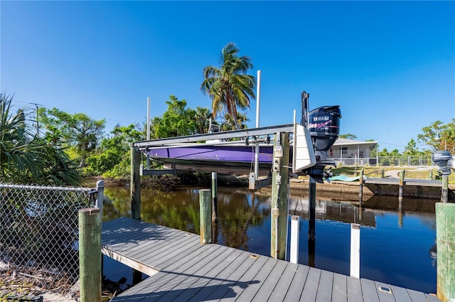 dock area featuring a water view