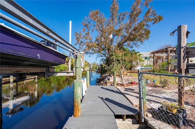 view of dock featuring a water view