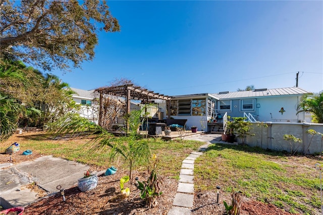 view of yard featuring a patio area and a pergola