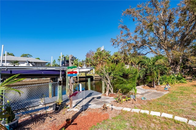 dock area with a water view