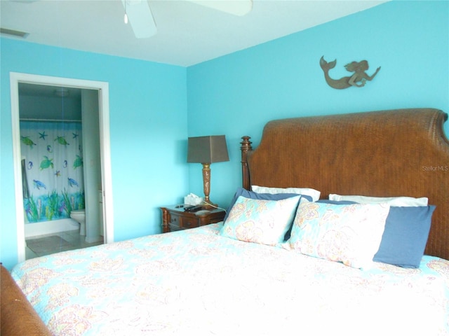 bedroom featuring ensuite bath and ceiling fan