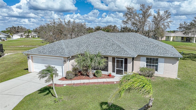 single story home featuring a front lawn and a garage