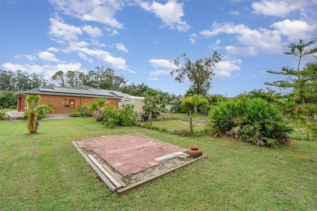 view of yard featuring a patio area