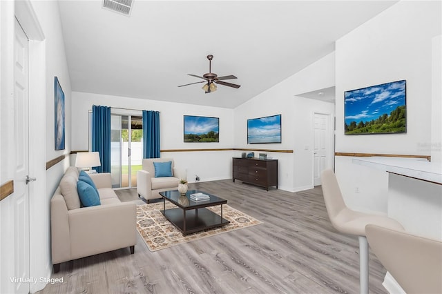 living room featuring high vaulted ceiling, light wood-type flooring, and ceiling fan