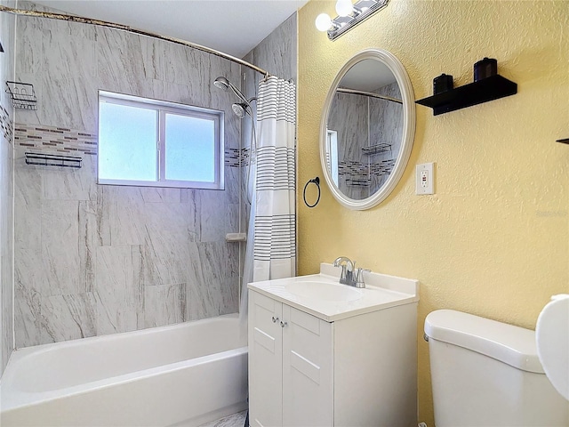 full bathroom with vanity, shower / tub combo with curtain, and toilet