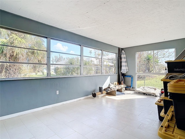 sunroom / solarium featuring a wealth of natural light