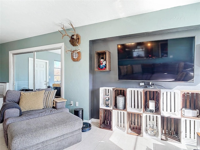 living room with light tile patterned flooring