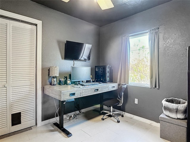 office space with light tile patterned floors