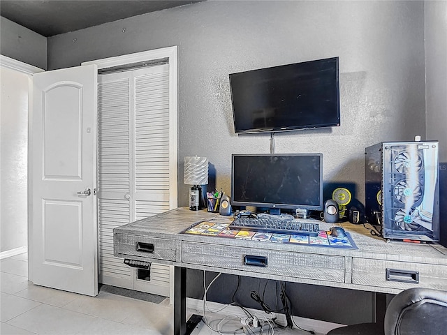 office area featuring light tile patterned floors