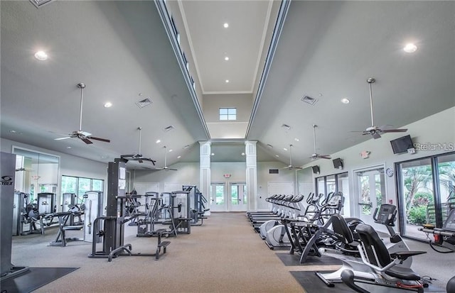 gym featuring high vaulted ceiling, light carpet, ceiling fan, and crown molding