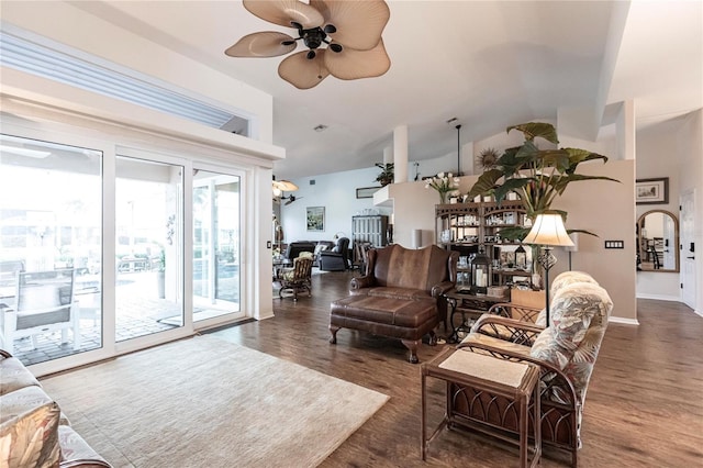 living room featuring ceiling fan and dark hardwood / wood-style floors