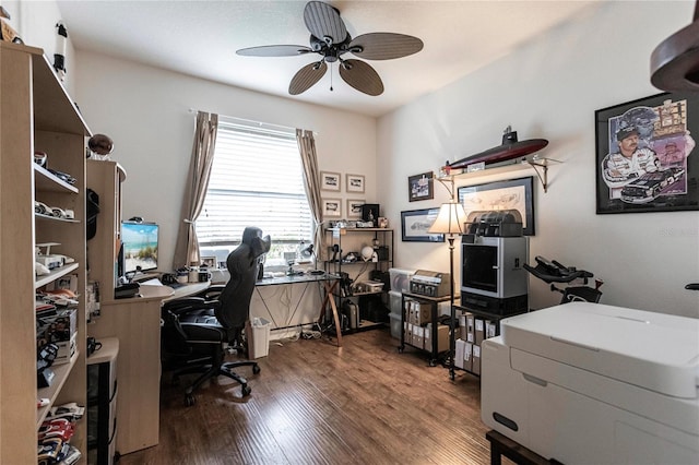 office space featuring dark hardwood / wood-style flooring and ceiling fan