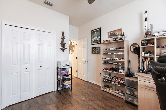 interior space with dark hardwood / wood-style flooring