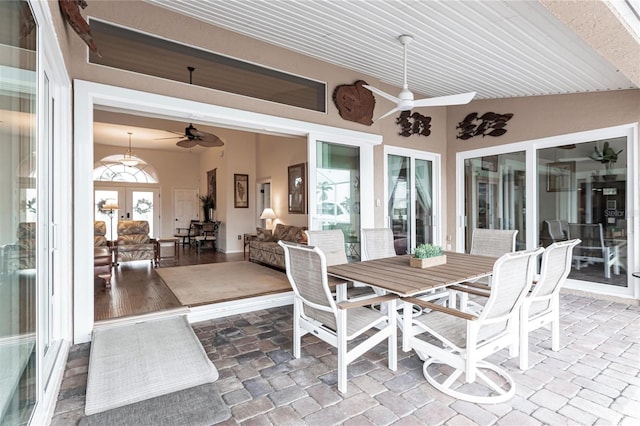 view of patio featuring ceiling fan