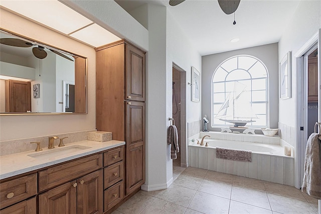 1215 Via Tripoli, Punta Gorda, FL 33950 - bathroom with a garden tub, vanity, ceiling fan, a shower, and tile patterned flooring