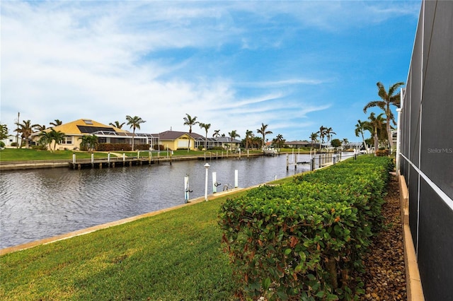 1215 Via Tripoli, Punta Gorda, FL 33950 - dock featuring a water view, a residential view, and a yard