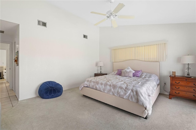 bedroom with ceiling fan, high vaulted ceiling, and carpet flooring