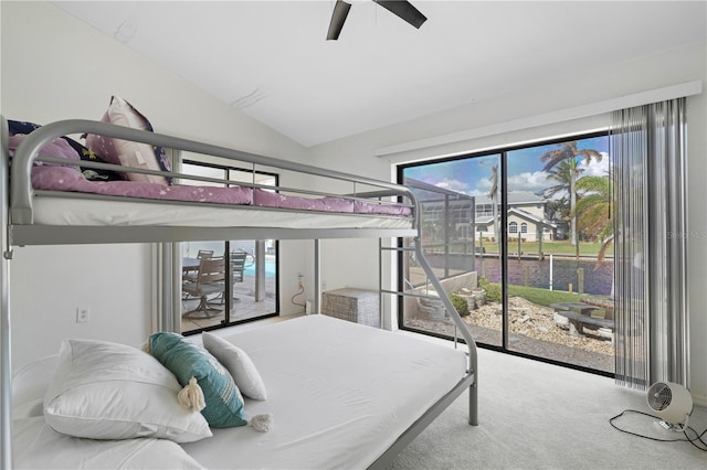 bedroom with vaulted ceiling, carpet floors, and ceiling fan