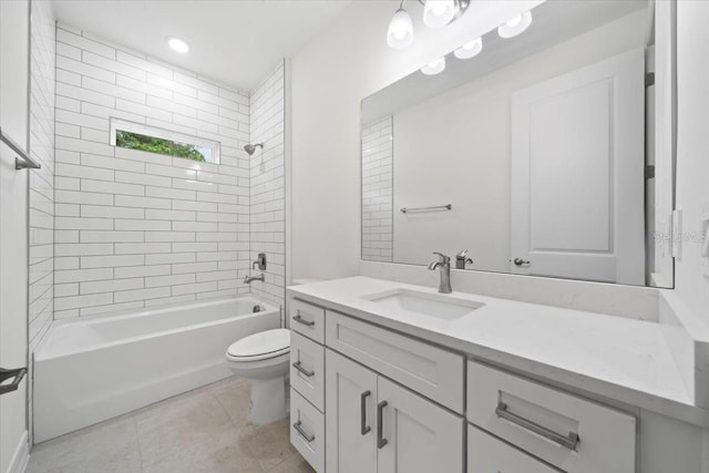 full bathroom with vanity, toilet, tile patterned floors, and tiled shower / bath