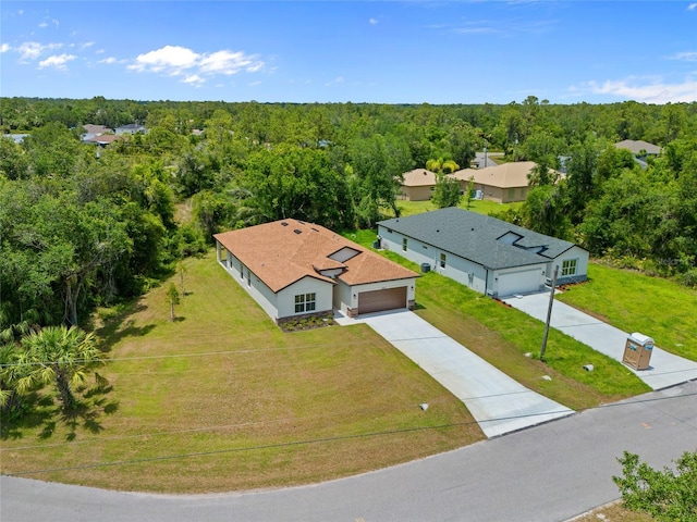3390 Nadasky Ave, North Port, FL 34288 - aerial view of property and surrounding area with a forest