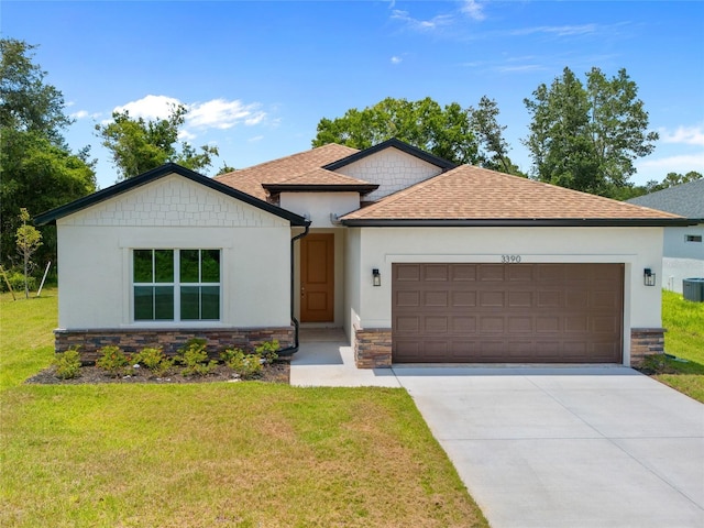 3390 Nadasky Ave, North Port, FL 34288 - ranch-style home featuring stone siding, roof with shingles, an attached garage, concrete driveway, and stucco siding