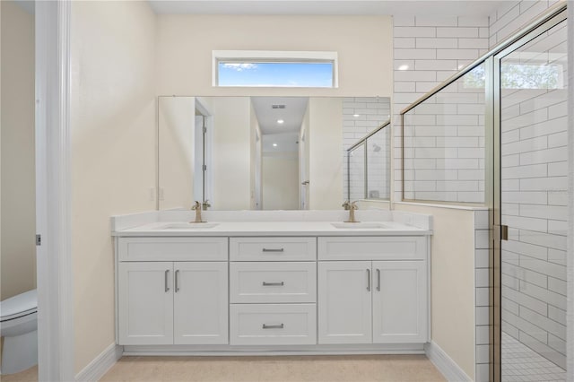 3390 Nadasky Ave, North Port, FL 34288 - full bath with toilet, a shower stall, double vanity, and baseboards