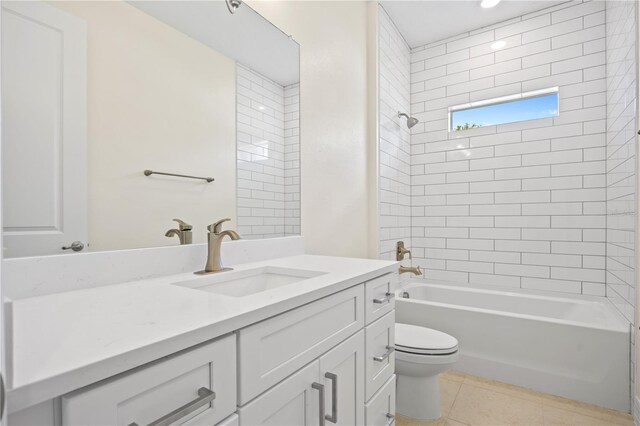 3390 Nadasky Ave, North Port, FL 34288 - full bathroom featuring vanity, toilet, bathing tub / shower combination, and tile patterned flooring