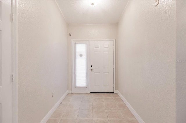 tiled entryway featuring plenty of natural light