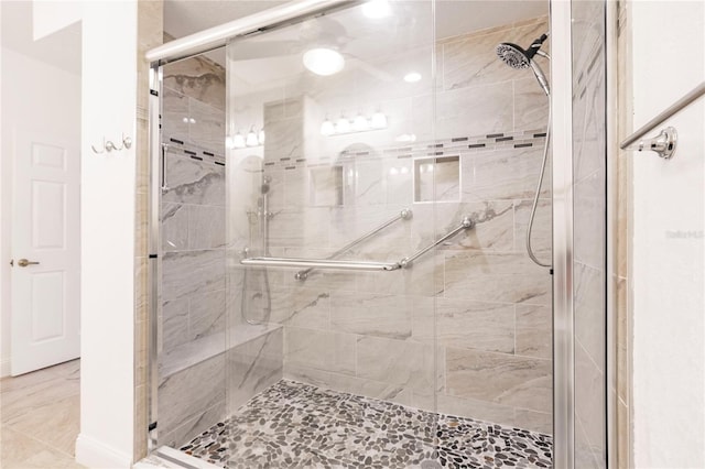 bathroom featuring an enclosed shower