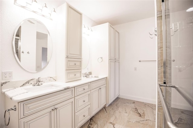 bathroom featuring walk in shower and vanity