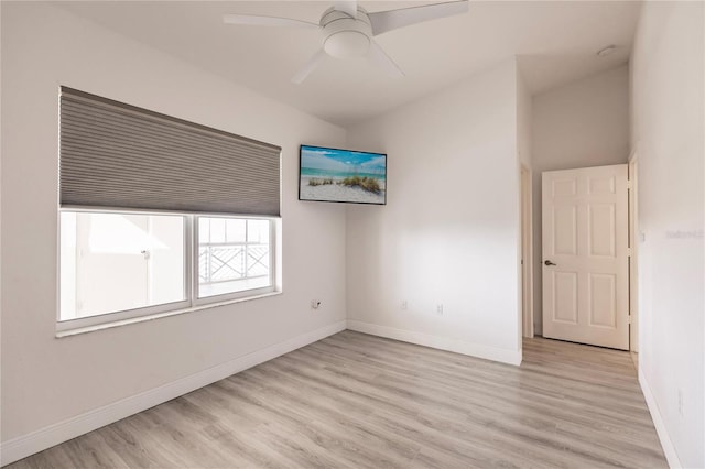 unfurnished room featuring ceiling fan and light hardwood / wood-style floors