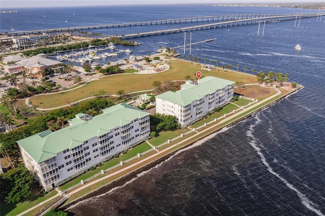 birds eye view of property featuring a water view