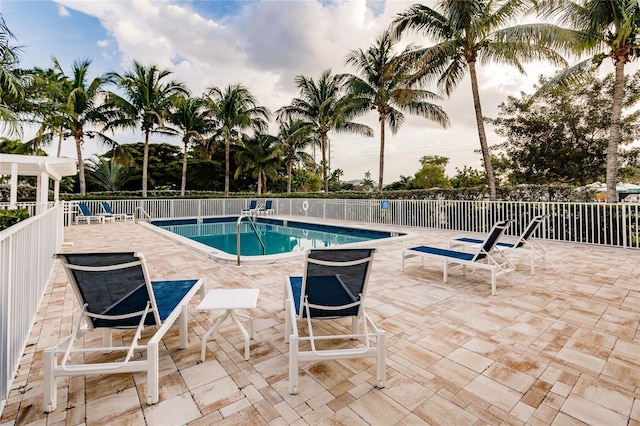 view of pool featuring a patio