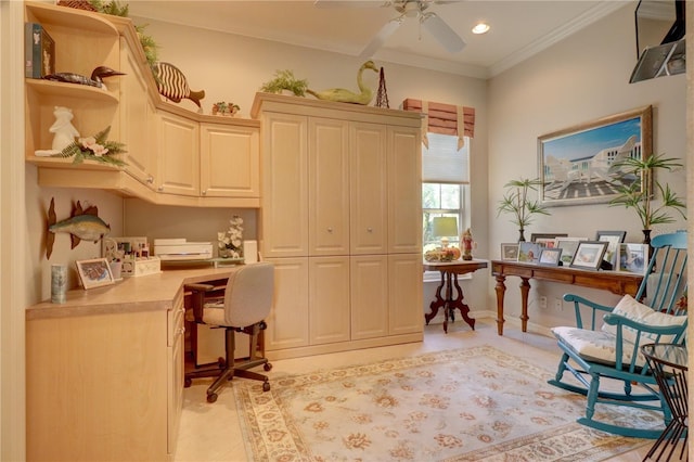 tiled home office with ornamental molding, built in desk, and ceiling fan