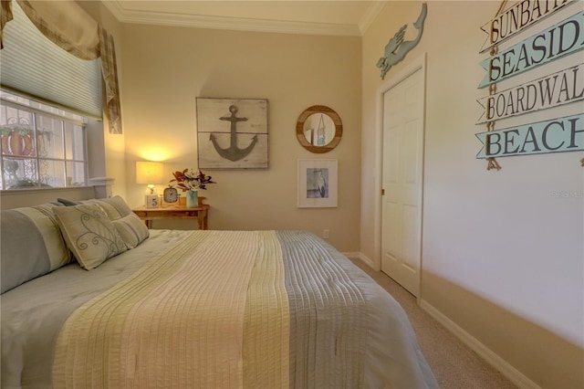 carpeted bedroom featuring crown molding