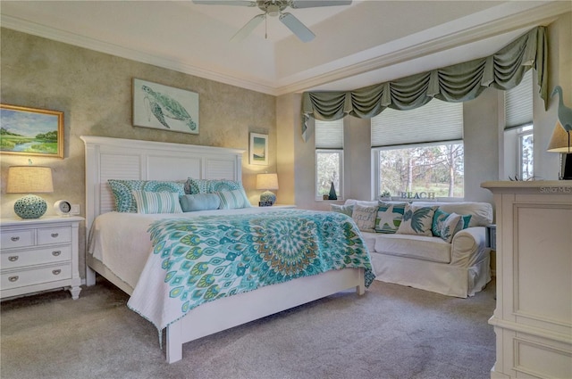 bedroom featuring crown molding, light colored carpet, and ceiling fan