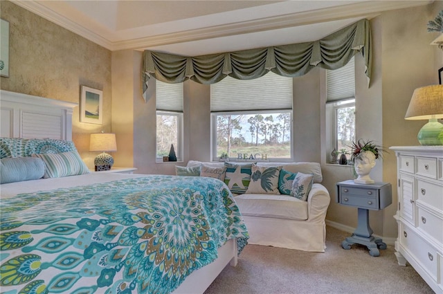 carpeted bedroom featuring crown molding