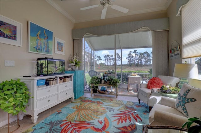 tiled living room featuring ceiling fan and ornamental molding