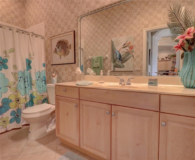 bathroom with vanity, a shower with shower curtain, toilet, and tile patterned flooring