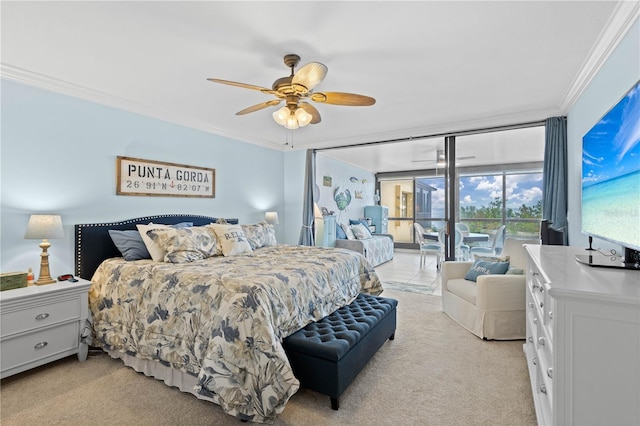 carpeted bedroom with ornamental molding, access to exterior, and ceiling fan