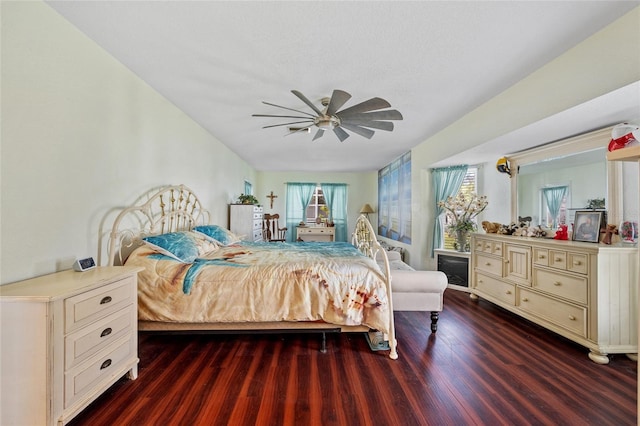 bedroom featuring dark wood-type flooring and ceiling fan