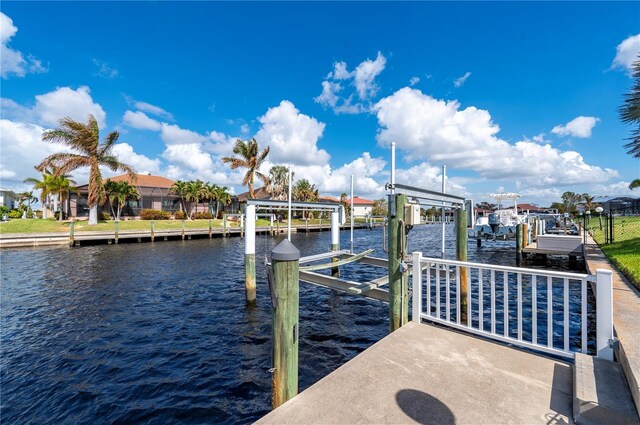 2736 Magdalina Dr, Punta Gorda, FL 33950 - view of dock with a water view and boat lift