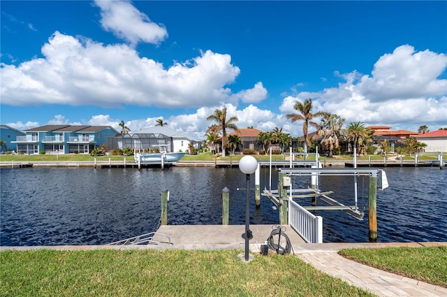 2736 Magdalina Dr, Punta Gorda, FL 33950 - dock area with a residential view, boat lift, and a water view