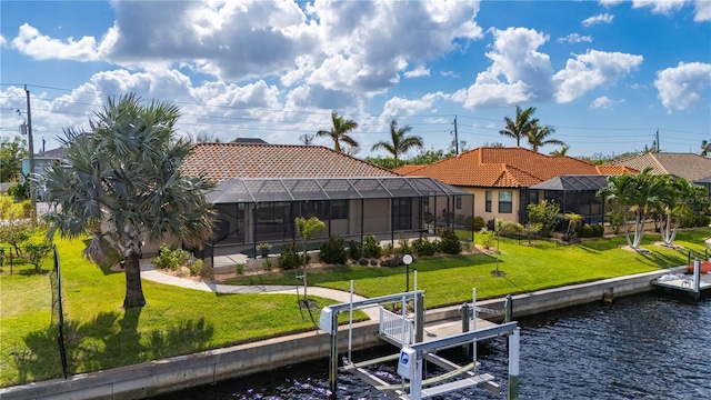 2736 Magdalina Dr, Punta Gorda, FL 33950 - rear view of house with a water view, a tile roof, and boat lift