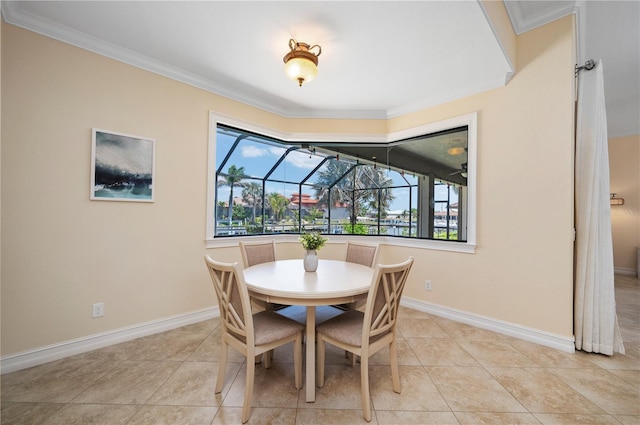 2736 Magdalina Dr, Punta Gorda, FL 33950 - tiled dining room featuring baseboards, ornamental molding, and a wealth of natural light