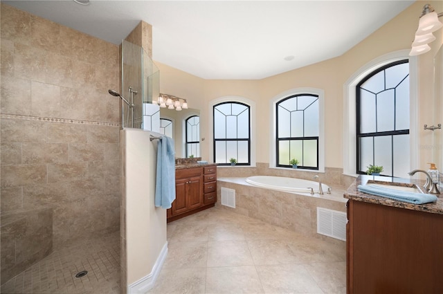 2736 Magdalina Dr, Punta Gorda, FL 33950 - full bath with walk in shower, visible vents, a bath, and vanity