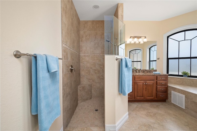2736 Magdalina Dr, Punta Gorda, FL 33950 - full bath featuring vanity, tile patterned flooring, walk in shower, and visible vents